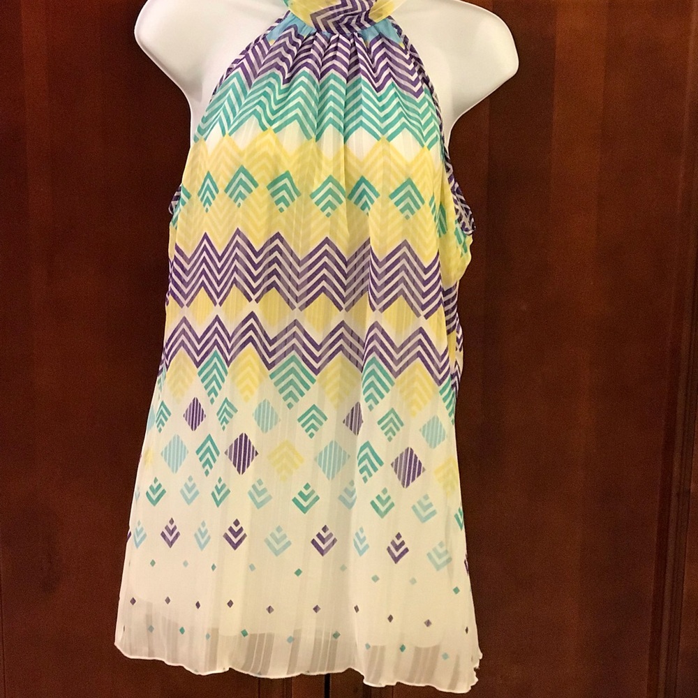 Sleeveless blouse. Multi-colored.